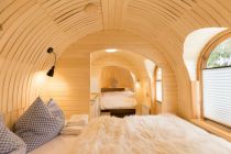 Holziglu von innen - Wohnen kannst Du außerdem in einem Holziglu. Von innen sieht es urgemütlich aus.  • © Camping Grüntensee International