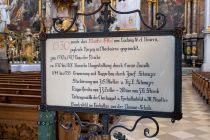 Kloster Ettal - Klosterbasilika - Eine Tafel am Eingang gibt einen kleinen Abriss der Historie der Basilika. • © alpintreff.de / christian Schön