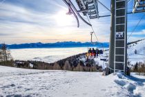 Hier ein Blick auf das Nebelmeer über dem Ossiacher See und der Region Villach. • © Gerlitzen Kanzelwand Touristik / Samitz