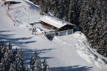 Die Sulzstichhütte am Rangger Köpfl im Winter. • © nnsbruck Tourismus / Alpine Luftbild