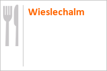 Die Brandalm ist das letzte Gebäude rechts an der Straße. • © Schladming-Dachstein.at / Herbert Raffalt