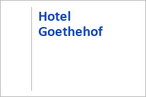 Das rote Hotel Eden Rock in Bad Gastein.  • © skiwelt.de - Christian Schön
